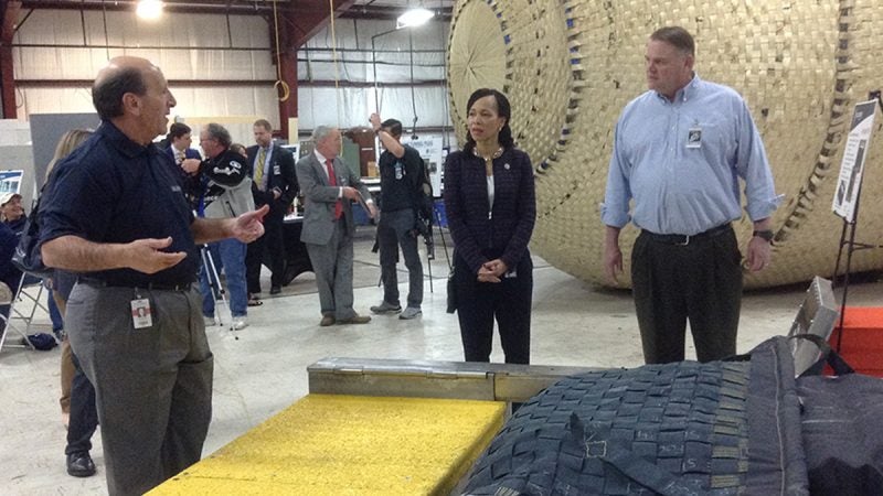 U.S. Rep. from Delaware Lisa Blunt Rochester and state Sen. Colin Bonini, R-Dover get a look at products made by ILC Dover. (Zoë Read/WHYY)