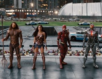 From left: Jason Momoa, Gal Gadot, Ezra Miller, and Ray Fisher in a scene from 