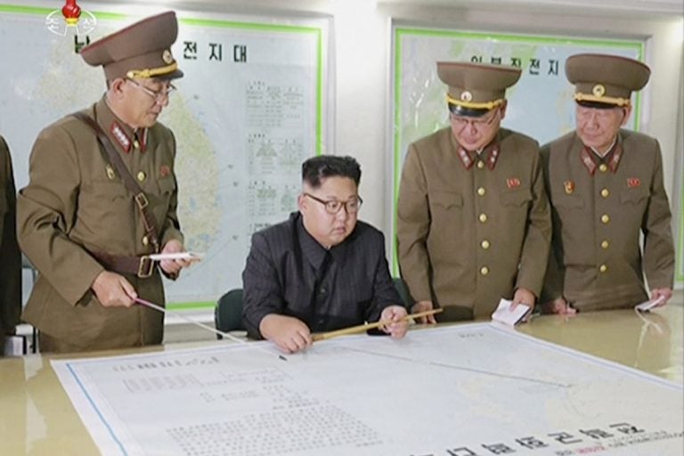 North Korean leader Kim Jong Un receives a military briefing