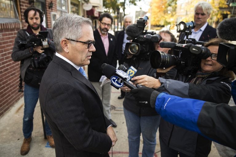 Larry Krasner speaks with members of the media outside of his polling place