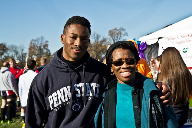 Josias Sterling’s brother John and his mother Marie attend the tournament, which raises money for aquatic education, every year. (Kimberly Paynter/WHYY)