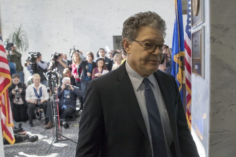 Sen. Al Franken, D-Minn., returns to his office after talking to the media on Capitol Hill in Washington