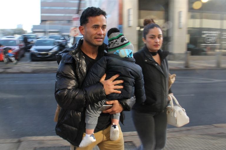 Osman Enriquez arrives at immigration enforcement offices in Philadelphia with his fiancee, Cindy, and year-old son, Jayden. Enriquez was threatened with deportation after his DACA application was lost in the mail.