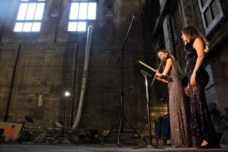 The soaring space that once held a million books at the Free Library's central branch becomes a temporary concert hall for flutist Anna Urrey and vocalist Katherine Skovira.