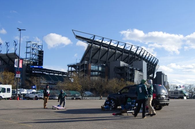 Fans set up to tailgate ahead of the Raiders vs. Eagles Christmas Day game, at the Lincoln Financial Field, on Monday.