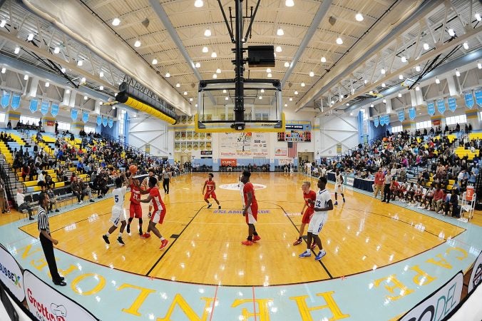 Basketball teams from California to Florida, Maryland, New Jersey, Pennsylvania, Washington, D.C. and New York along with Delaware players came together for the Annual Slam Dunk To The Beach held at Cape Henlopen High School in Lewes on December 27-29.  (Chuck Snyder/for WHYY)