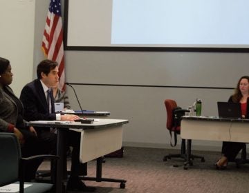 Mastery CEO Scott Gordon speaks during the charter hearings Dec. 18. On his left is Wyneshia Foxworth, the school leader of the proposed charter school. (Greg Windle/The Notebook)