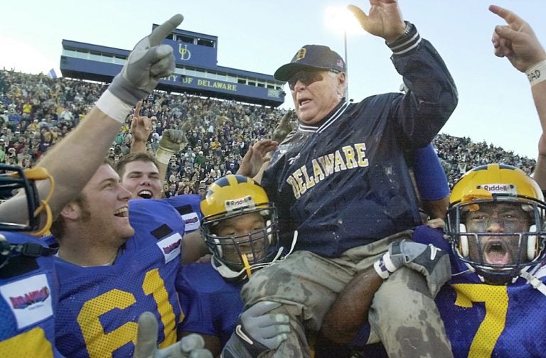 Delaware coach Tubby Raymond is hoisted onto the shoulders of his players after becoming the ninth college football coach to reach 300 wins, after Delaware beat Richmond 10-6 in Newark, Del., Saturday, Nov. 10, 2001. Raymond died this week at the age of 92. (William Bretzger/AP Photo)