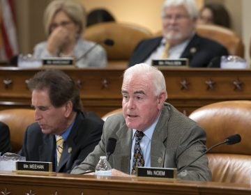 Rep. Pat Meehan, R-Pa., with Rep. Jim Renacci, R-Ohio, left, work on the markup of the GOP's far-reaching tax overhaul, on Capitol Hill in Washington, Monday, Nov. 6, 2017.