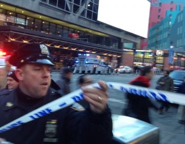 Police respond to a report of an explosion near Times Square on Monday, Dec. 11, 2017, in New York.