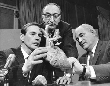 *** FILE *** Dr. Christian Barnard of South Africa, Dr. Michael DeBakey of Huston, Tex. center, USA, and Dr. Adrian Kantrowitz of Brooklyn, N.Y., right, confer Dec. 24, 1967 in Washington, before appearing on the CBS television program 