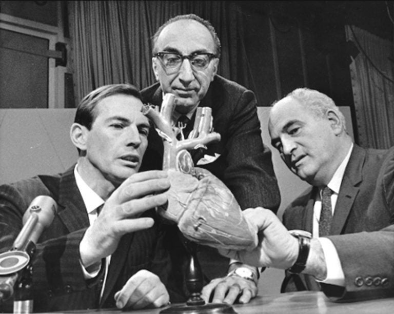 *** FILE *** Dr. Christian Barnard of South Africa, Dr. Michael DeBakey of Huston, Tex. center, USA, and Dr. Adrian Kantrowitz of Brooklyn, N.Y., right, confer Dec. 24, 1967 in Washington, before appearing on the CBS television program 