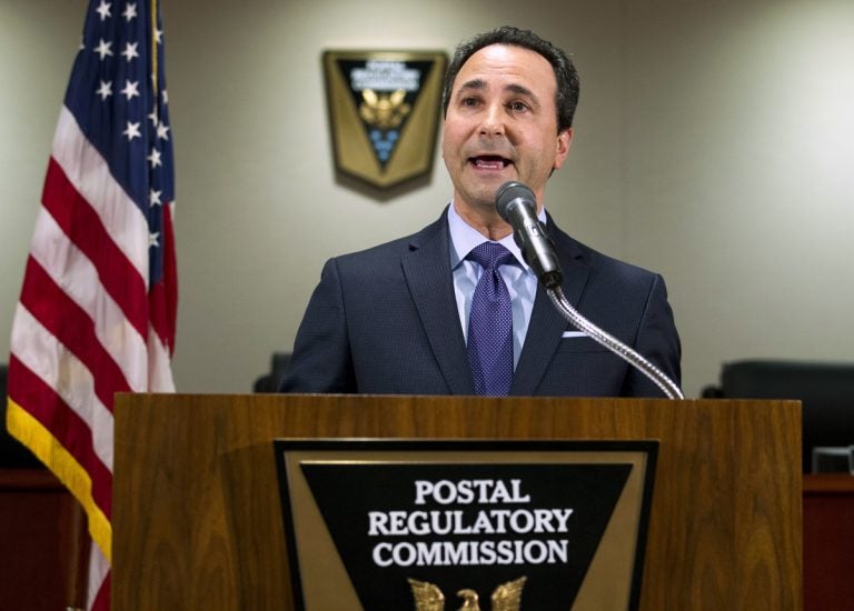 Postal Regulatory Commission Chairman Robert Taub speaks during a news conference in Washington, Friday, Dec. 1, 2017. Federal regulators are moving to give the U.S. Postal Service more freedom to raise stamp costs beyond the rate of inflation. The commission's proposal would allow the beleaguered Postal Service to increase the price of a first-class stamp by an additional 2 percent above the rate of inflation to avoid bankruptcy and improve mail and package delivery. ( Jose Luis Magana/AP Photo)