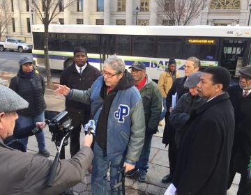 Social activists have received 1,300 petitions against a plan to reroute Wilmington buses. (WHYY/Paul Parmalee)