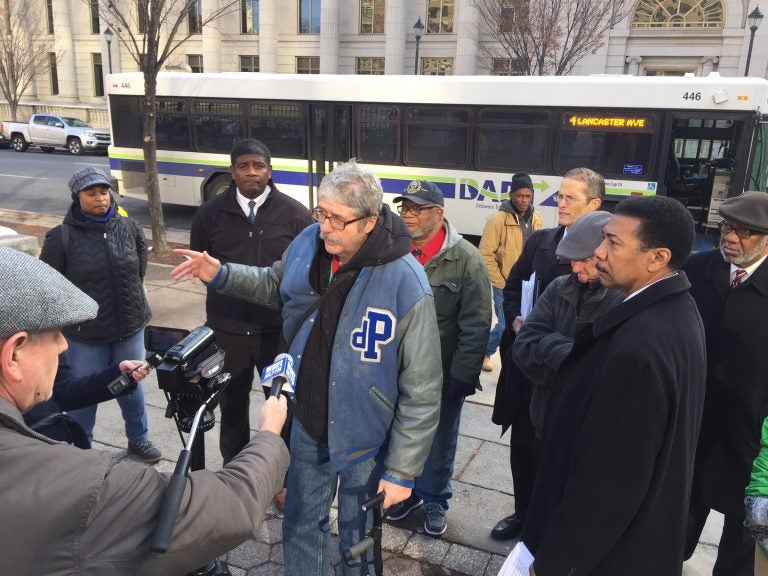 Social activists have received 1,300 petitions against a plan to reroute Wilmington buses. (WHYY/Paul Parmalee)