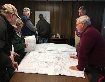 Somerset County residents examine a map of the proposed Keyser mine Tuesday at a meeting with officials from the Department of Environmental Protection. (Amy Sisk/StateImpact Pennsylvania)