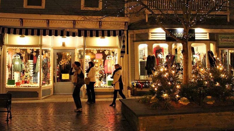 Even at night people still like to walk on the Washington Street Mall. (Bill Barlow/for WHYY)