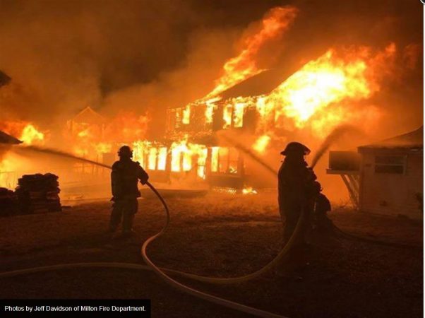 Flames engulf a Slaughter Beach on Christmas night. (Jeff Davidson of Milton Fire Department/courtesy Indian River Vol. Fire Co.)