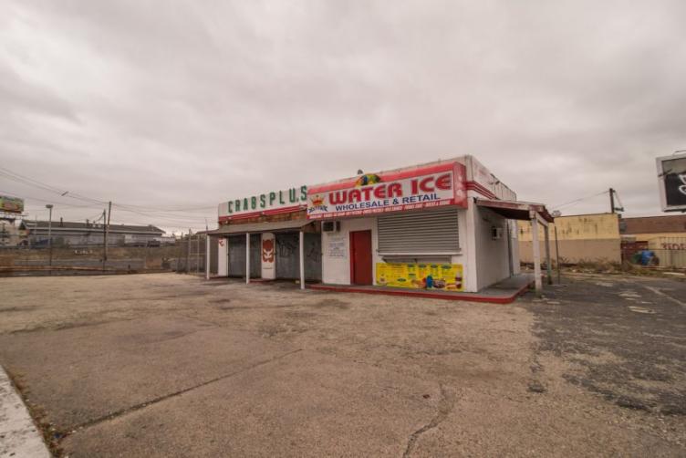 An abandoned wholesale crabs and water ice business sits at Lehigh Avenue and West Oakdale Street. 