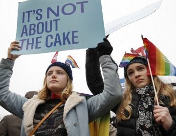 Lydia Macy, 17, left, and Mira Gottlieb, 16, both of Berkeley, Calif., rally outside of the Supreme Court which is hearing the 'Masterpiece Cakeshop v. Colorado Civil Rights Commission' today, Tuesday, Dec. 5, 2017, in Washington. (AP Photo/Jacquelyn Martin)