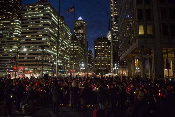 Hundreds of Philadelphians gather at Thomas Paine Plaza on Wednesday night to remember those who are homeless, formerly homeless. (Emily Cohen for WHYY)