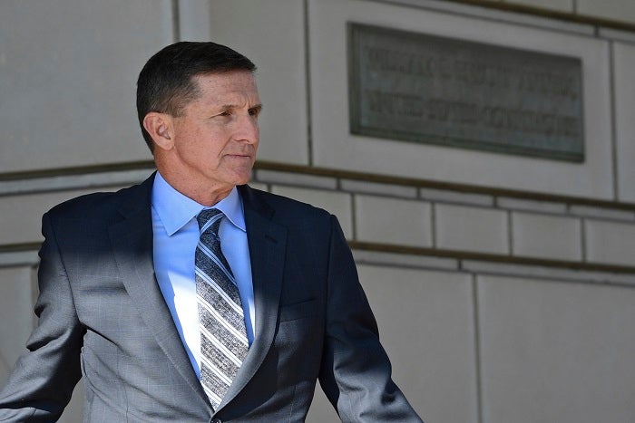 Former Trump national security adviser Michael Flynn leaves federal court in Washington, Friday, Dec. 1, 2017. Flynn pleaded guilty Friday to making false statements to the FBI, the first Trump White House official to make a guilty plea so far in a wide-ranging investigation led by special counsel Robert Mueller.  (AP Photo/Susan Walsh)