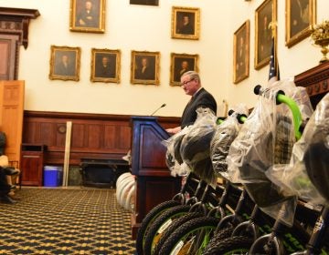 Mayor Jim Kenney speaks before giving away new bikes Wednesday at a City Hall ceremony. (Tom MacDonald/WHYY)