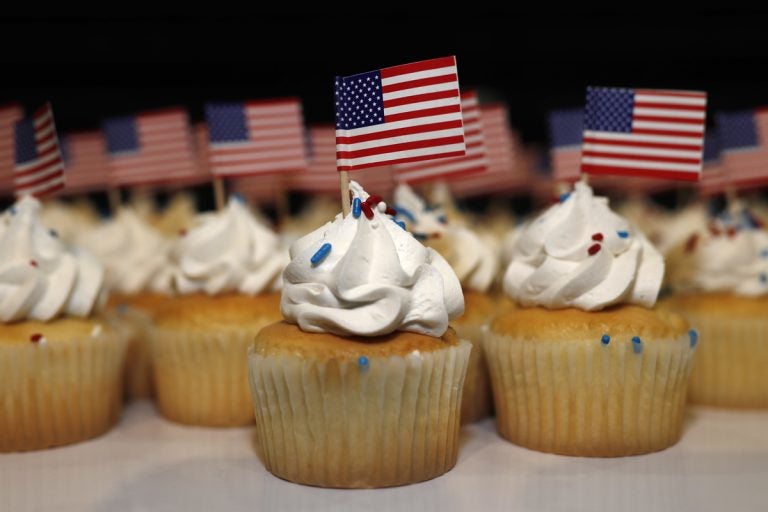 Cupcakes adorned with American flags sit on trays for supporters of Jack Phillips, owner of Masterpiece Cake