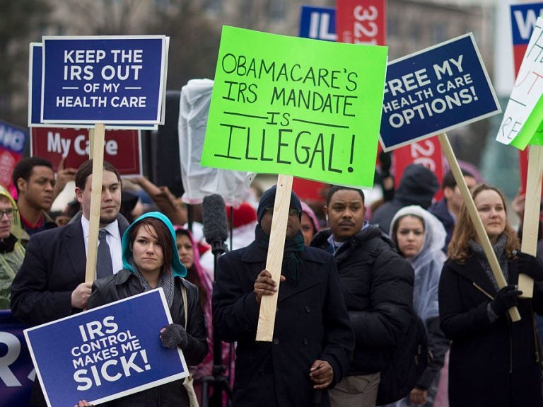 Opposition to Obamacare has been strong from the beginning. Demonstrators made their dissatisfaction clear in front of the Supreme Court in 2015. (Andrew Harrer/Bloomberg via Getty Images)