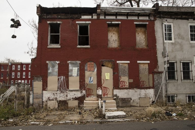 Shown are blighted and abandoned row homes in Philadelphia