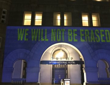 The Human Rights Campaign, an LGBTQ civil rights organization, projected seven words that were allegedly banned from some CDC documents onto the facade of the Trump International Hotel in Washington, D.C., on Tuesday. (Human Rights Campaign)