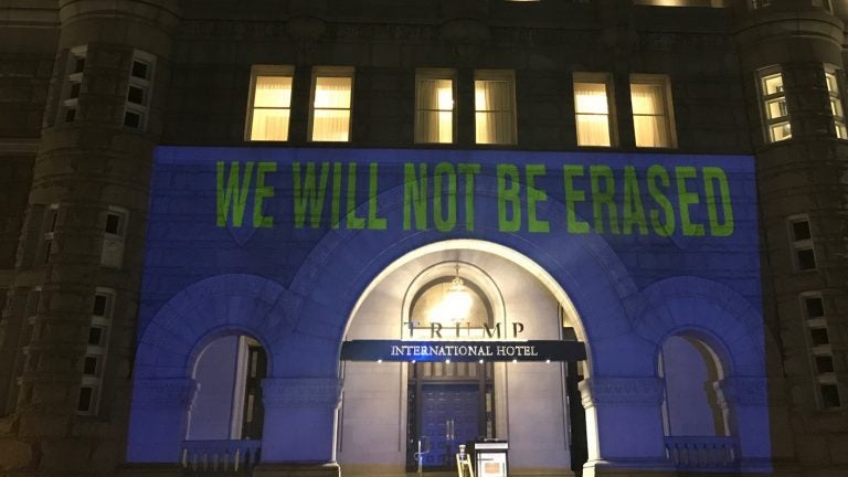 The Human Rights Campaign, an LGBTQ civil rights organization, projected seven words that were allegedly banned from some CDC documents onto the facade of the Trump International Hotel in Washington, D.C., on Tuesday. (Human Rights Campaign)