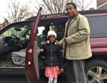 Waliyyuddin Abdullah drops off daughter Florrie, a first grader, at Powel School in West Philadelphia. Abdullah chose Powel over his neighborhood school in North Philadelphia.