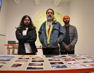 Artists (from left) Ricky Yanas, Grimaldi Baez and Sheldon Abba at their exhibit, 