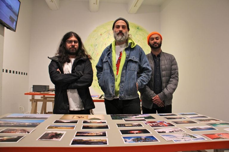 Artists (from left) Ricky Yanas, Grimaldi Baez and Sheldon Abba at their exhibit, 