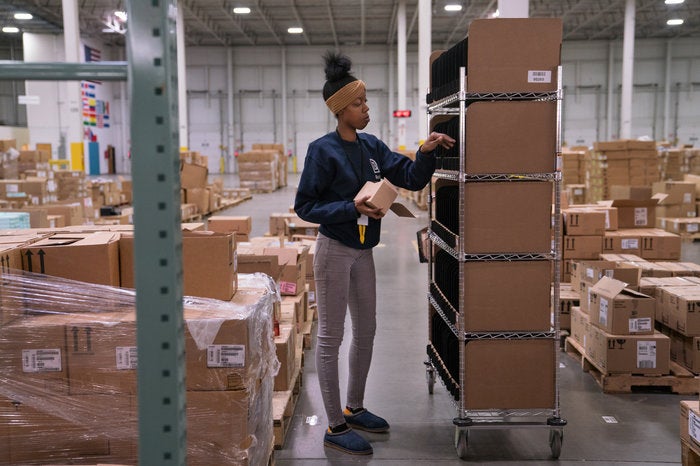 Alvine Bunch, 23, used to work at Amazon as a picker, but now does the same work at Radial. She says she does expect more robots in warehouses of the future "but not to the point whereas there's just no work to do." 