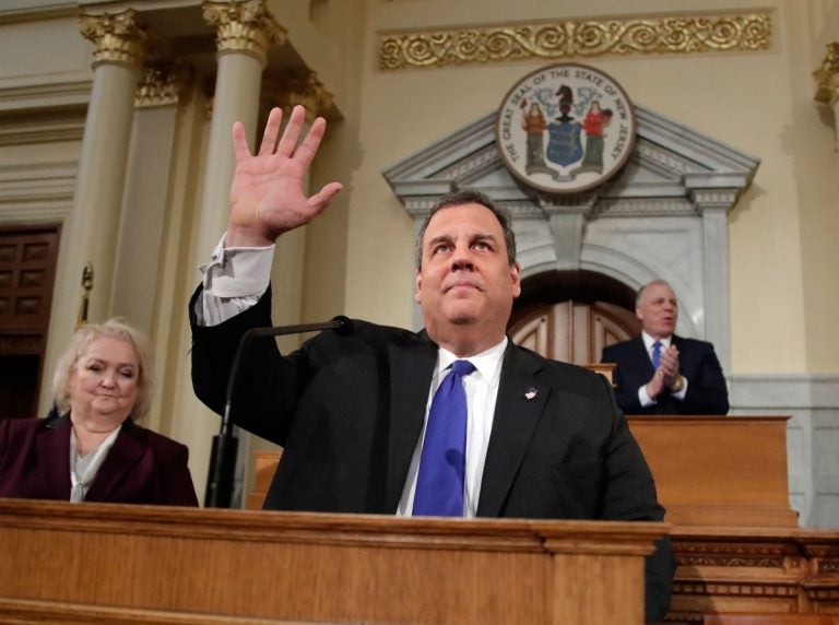 New Jersey Gov. Chris Christie waves to lawmakers before delivering his final state of the state address at the Statehouse in Trenton Tuesday. (Julio Cortez/AP Photo)