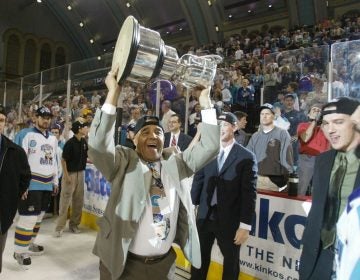 Art Dorrington, former Sea Gull, hoists the Kelly Cup after the Boardwalk Bullies won game 5 of the East Coast Hockey League's championship series at Boardwalk Hall in Atlantic City on May 14, 2003.