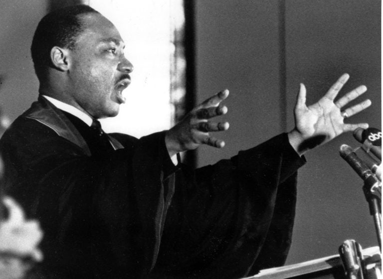 The Rev. Dr. Martin Luther King Jr. gestures and shouts to his congregation in Ebenezer Baptist Church in Atlanta, Ga. on April 30, 1967 as he urges America to repent and abandon what he called its 