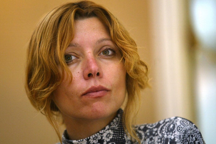 ** FILE ** Turkish author Elif Shafak is seen during an interview with The Associated Press in Istanbul, Turkey, in this Tuesday, Aug. 22, 2006 file photo.  A Turkish court on Thursday, Sept. 21, 2006, acquitted Elif Shafak, one of Turkey's leading authors, saying there was no evidence that she 
