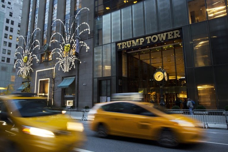 Traffic passes Trump Tower, Monday, Nov. 21, 2016, in New York.