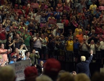 President Donald Trump waves to the crowd after speaking at the U.S. Cellular Center in Cedar Rapids, Iowa, Wednesday, June 21, 2017. This is Trump's first visit to Iowa since the election.