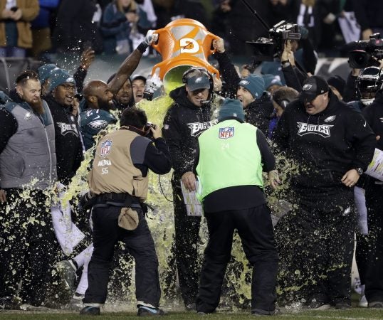 Philadelphia Eagles head coach Doug Pederson is dunked during the second half of the NFL football NFC championship game against the Minnesota Vikings Sunday, Jan. 21, 2018, in Philadelphia. (AP Photo/Matt Slocum)