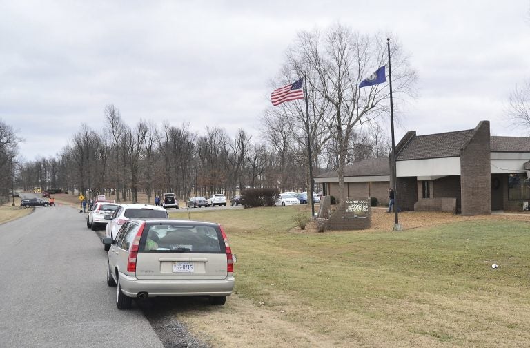 Authorities investigate the scene of school shooting, Tuesday, Jan 23, 2018, in Benton, Ky. Kentucky State Police said the suspect was apprehended by a Marshall County deputy.