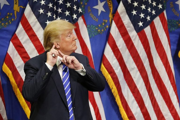 FILE -- In this Oct. 8, 2015 file photo, Republican presidential candidate Donald Trump reacts after speaking at a rally , in Las Vegas.