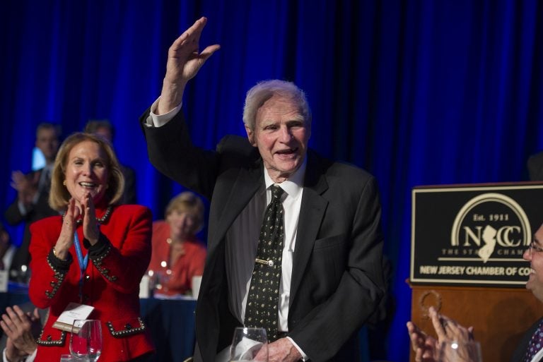 Former N.J. Gov. Brendan Byrne waves as the audience sings him Happy Birthday, as his wife Ruthi Zinn Byrne applauds, for his 90th birthday during the N.J. State Chamber of Commerce annual Congressional Dinner in Washington, Tuesday, April 22, 2014. (AP Photo/Cliff Owen)
