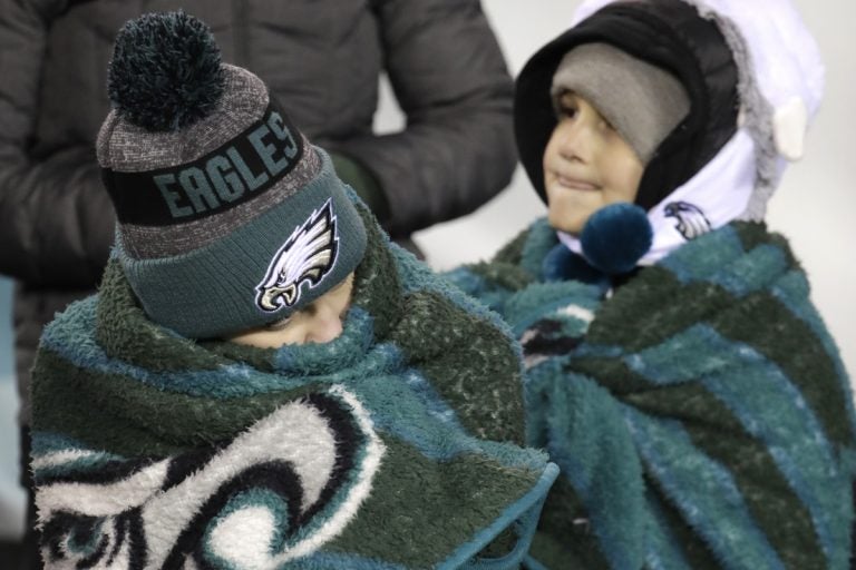 Young fans watch during the first half of an NFL divisional playoff football game between the Philadelphia Eagles and the Atlanta Falcons, Saturday, Jan. 13, 2018, in Philadelphia. (Chris Szagola/AP Photo)