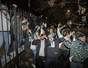 Fans celebrate outside Lincoln Financial Field after the NFL football NFC championship game between the Philadelphia Eagles and the Minnesota Vikings Sunday, Jan. 21, 2018, in Philadelphia. The Eagles won 38-7 to advance to Super Bowl LII. (Matt Slocum/AP Photo)