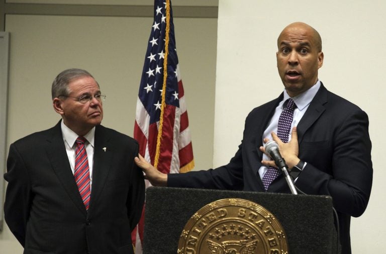 Sen. Bob Menendez, D-NJ, (left), and Sen. Cory Booker, D-NJ (Mel Evans/AP Photo, file)