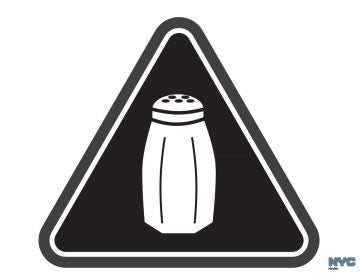In this undated image provided by the New York City Health Department, a graphic warning New York city consumers of high salt content in foods required on menus at many fast-food and chain restaurants is shown. New York City plans to start enforcing a first-of-its-kind requirement for warning icons on salty chain restaurant foods on June 6, 2016, after getting an appeals court's go-ahead to start issuing fines. (Antonio D'Angelo/New York City Health Department via AP)